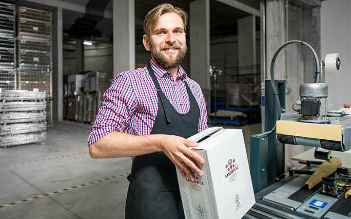 man with box in hand